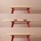 Mesa de jantar extensível MELOE de 140/180 cm com pés de metal em terracota e tampo com acabamento em carvalho. - 5